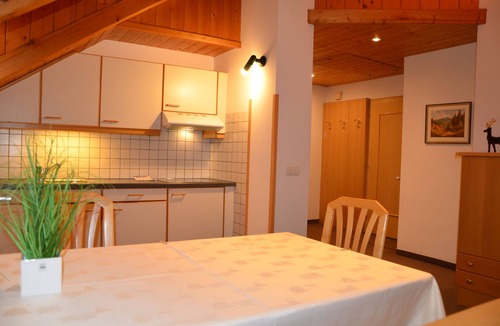 Ortisei Apartment | Comfortable attic room with panoramic view & balcony - free Wi-Fi