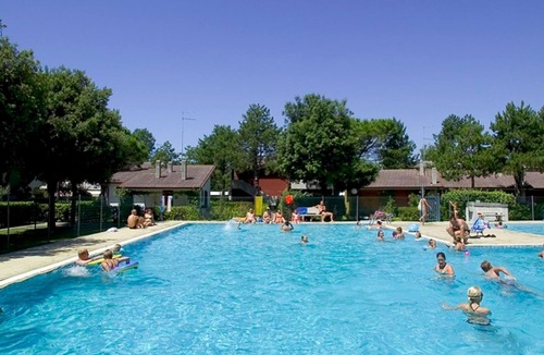 Bibione Apartment | Comfortable two room apartment with garden and swimming pool by Beahost Rentals