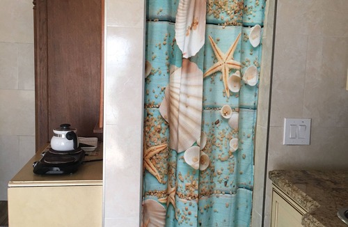 Treasure Cay Cottage | Cottage nestled in Leisure Lee Waterways. Close to beaches with Dock rentals