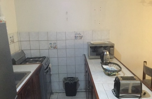 Molynes Gardens House | Cozy town house with two bedrooms that sleeps a maximum of four persons.