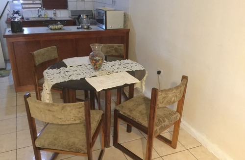 Molynes Gardens House | Cozy town house with two bedrooms that sleeps a maximum of four persons.