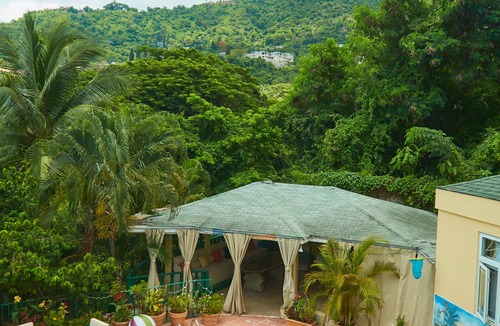 Jack's Hill House | Crowne Gardens. Safe, quiet, luxurious Kingston home with a scenic view.