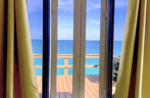 Alice Town House | Deck Overhangs Ocean, Walk to Beaches/Bars/Restaurants, WiFi, On-site Parking