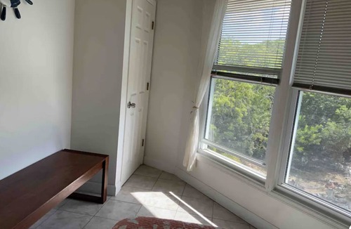 Calvin Hill House | DéJa Vu Central Location, Steps from Beach, Close To All