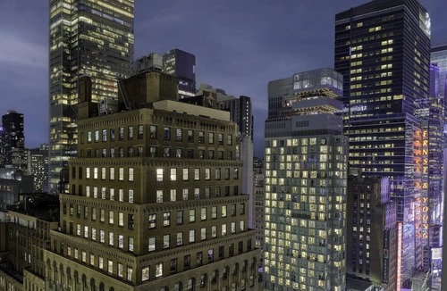 Midtown Hotel | Deluxe Room One King Bed at Margaritaville Resort Times Square