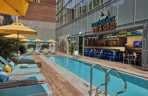 Midtown Hotel | Deluxe Room One King Bed at Margaritaville Resort Times Square