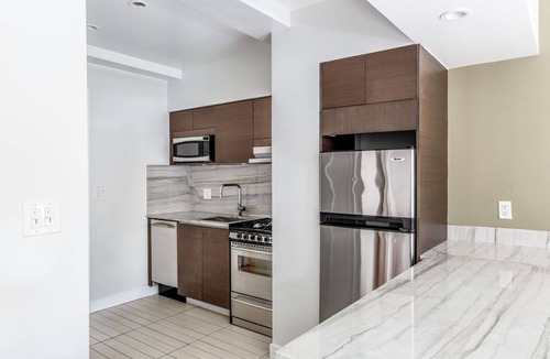 Sutton Place Apartment | Deluxe Sutton Place 1BR w/Doorman & Gym, nr Sutton Park, by Blueground