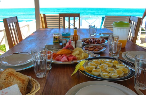 Treasure Beach Villa | Doubloon Villa, large pool and sandy beach at heart of Treasure Beach