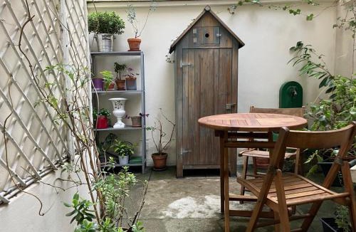 Faubourg Saint-Germain Apartment | Duplex and private patio at Eiffel Tower