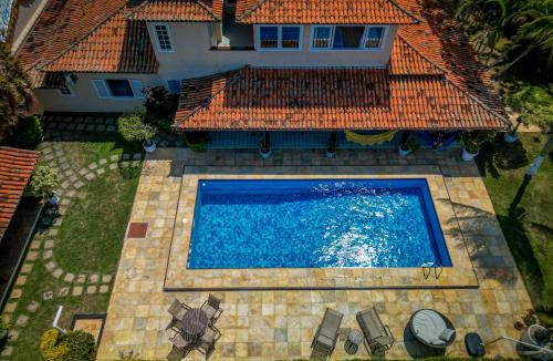 Manguinhos House | Duplex Geriba 250m da praia, rede futevôlei, sauna