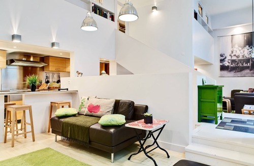 Saint-Merri Apartment | Elegant Loft in Historic Parisian Mansion with Courtyard Charm