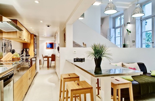 Saint-Merri Apartment | Elegant Loft in Historic Parisian Mansion with Courtyard Charm