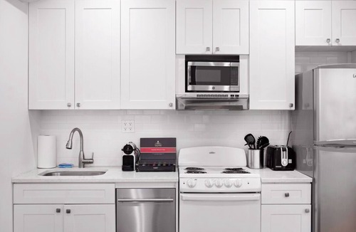 Hudson Square Apartment | Fantastic 2-Bedroom Townhouse with Private Balconies in West Village