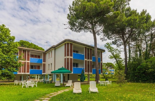 Bibione Pineda Apartment | Gabbiano tree-room flat surrounded by the green of the quite pine forest