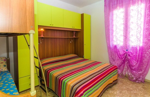 Bibione Pineda Apartment | Gabbiano tree-room flat surrounded by the green of the quite pine forest