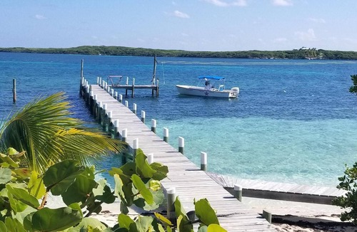 Lubbers Quarters Cay House | Green Bananas Cottage with sandy beach and private dock