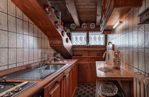 Cortina d'Ampezzo Historic Centre Apartment | GuestHost - Charming 45 sqm apartment, with fine wooden finishes and mountain view, ideal for two guests, located on the 4th floor of a characteristic building. The property is located in the heart of Cortina, along the famous Corso Italia, a 7-minute wa