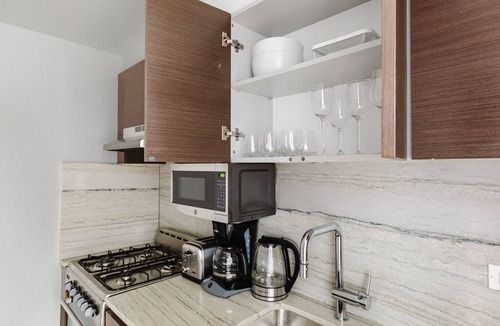 Midtown South Apartment | Hip Kips Bay Studio w/Gym & W/D, close to Park Ave, by Blueground