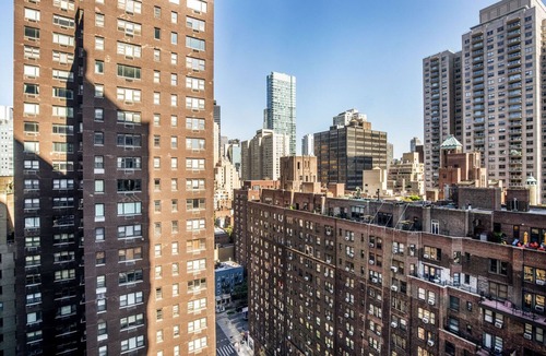 Sutton Place Apartment | Hip Midtown East 2BR w/Gym, Doorman & W/D, nr Parks, by Blueground