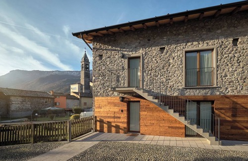 Cerete Apartment | Historic 1940s Watermill: A Designer Retreat in the Italian Alps