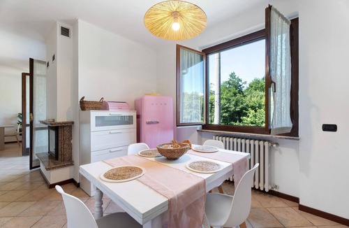 Angera House | Holiday Home 'Villa Fox' with Garden, Balcony & Shared Wi-Fi