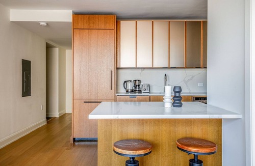 Sutton Place Apartment | Ideal Midtown East 2BR w/Gym & Roofdeck, nr Parks, by Blueground