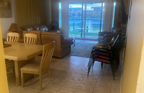 Bahamia West House | It's Island Time! Large condo with dock and a view in the heart of Freeport.