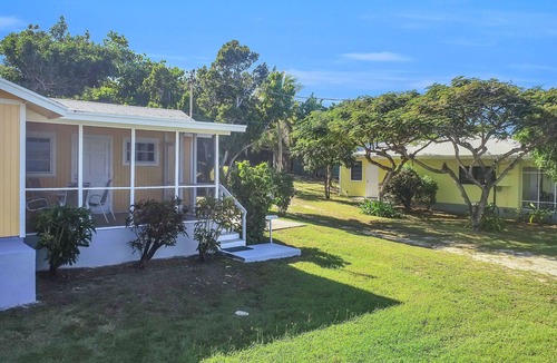 George Town Cottage | Ixora West - Views over Elizabeth harbor, beach access across the road.