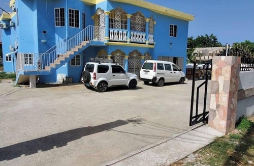 Tower Isle House | JCCL Party Enterprise, Hidden Lodge Apartments