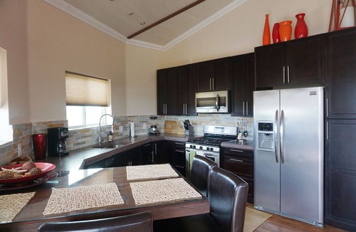 Staniel Cay Villa | Layin' Low includes one golf cart/villa with water views