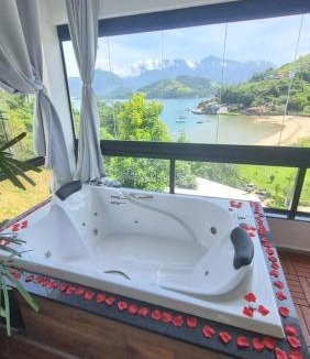 Biscaia Apartment | Loft Praia da Tartaruga com Hidromassagem