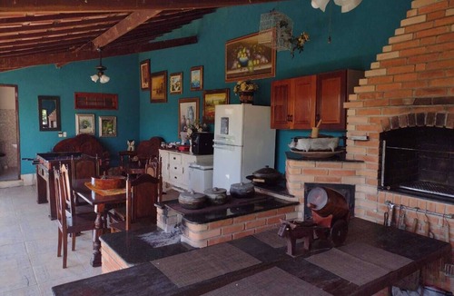 Quatis House | Lovely place, suite with fireplace.