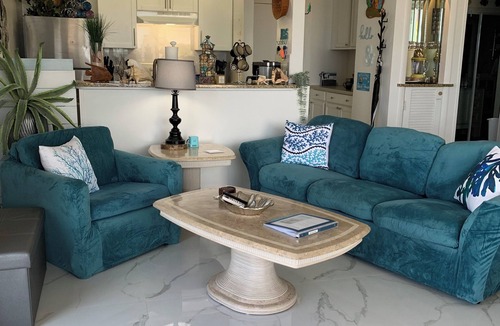 Discovery Bay Condo | Luxurious Beachfront Condo with Breath Taking Ocean, Beach and Garden Views.