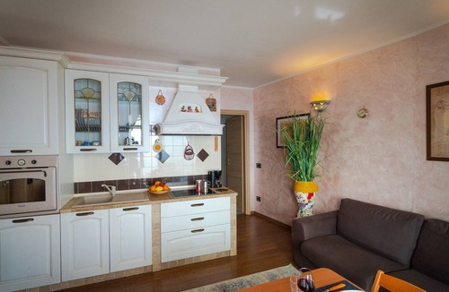 Plassi Apartment | Mantegna - garten mit seeblick und schwimmbad by Interhome