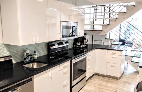 Kips Bay Apartment | "Midtown East Townhouse Apt w/ Garden - Modern"