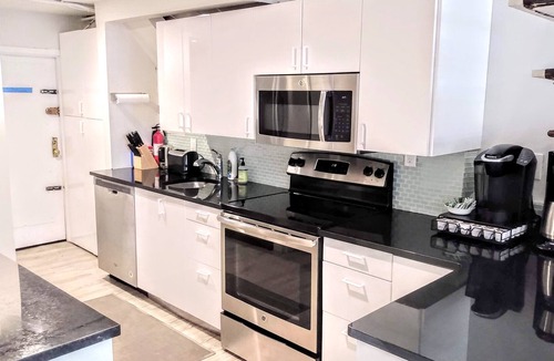 Kips Bay Apartment | "Midtown East Townhouse Apt w/ Garden - Modern"