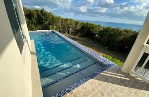Governor's Harbour House | Modern Caribbean-Front Home w Large pool in TOP Location-Snorkel-Cave-SUP-Kayak!