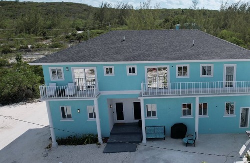 Jimmy Hill Condo | Modern Spacious Villa steps away from a beautiful private beach