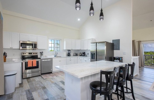 North Palmetto Point House | New Banks Road Estate Home w/Heated Pool on Pink Sand Poponi Beach