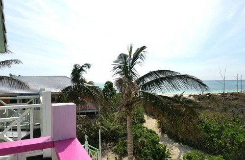 Freeport Cottage | Paradise on miles of white sandy beach and turquoise sea, private and secure.