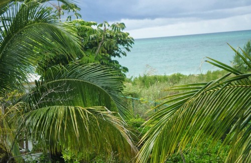 Mather Town Cottage | Paradise on miles of white sandy beach and turquoise sea, private and secure.