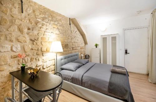 Quartier de Rochechouart Apartment | Paris entre Opéra et Montmartre