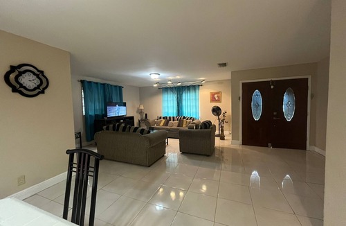 Bahamas Terrace House | Quiet getaway near Xanadu Beach, Freeport with Central Air, WiFi & free parking.