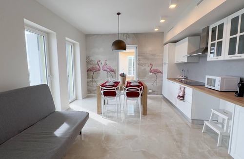 Chioggia Apartment | Seafront Modern Flamingo Suite by Ca-sa Check