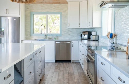 William's Town Villa | Sugar Beach Villa, - sprawling estate with hot tub, pool, and private cottages