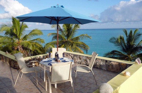 Great Exuma Villa | Sundowner house, beach front, one of the best views on the island. Sleeps 6.