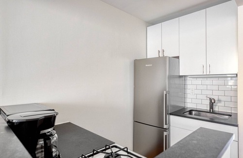 Bowery Apartment | Sunlit East Village 1BR w/W/D, nr First Park, by Blueground