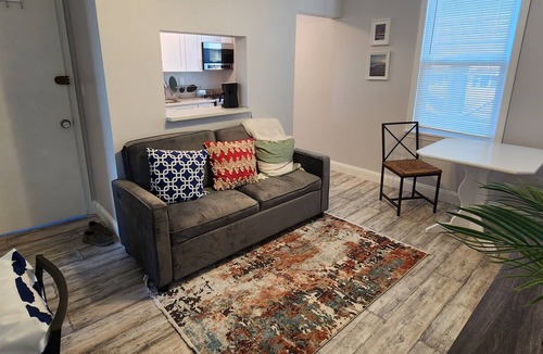 Queens Apartment | Surfer's Paradise 2 blocks from the beach in NYC with shared fenced-in backyard.