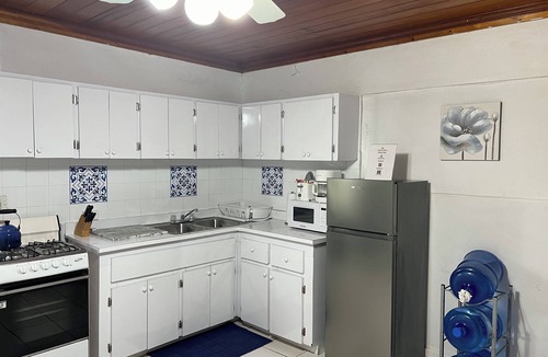 Nassau Apartment | Tangerine Sunsets Winton Rose