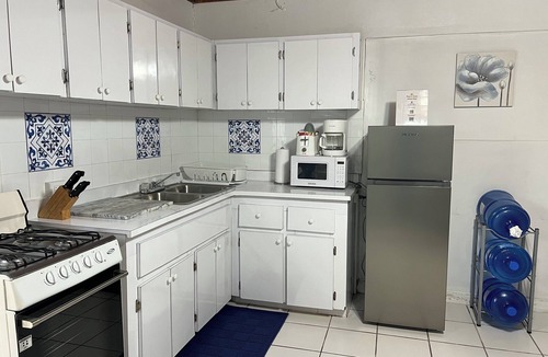 Nassau Apartment | Tangerine Sunsets Winton Rose
